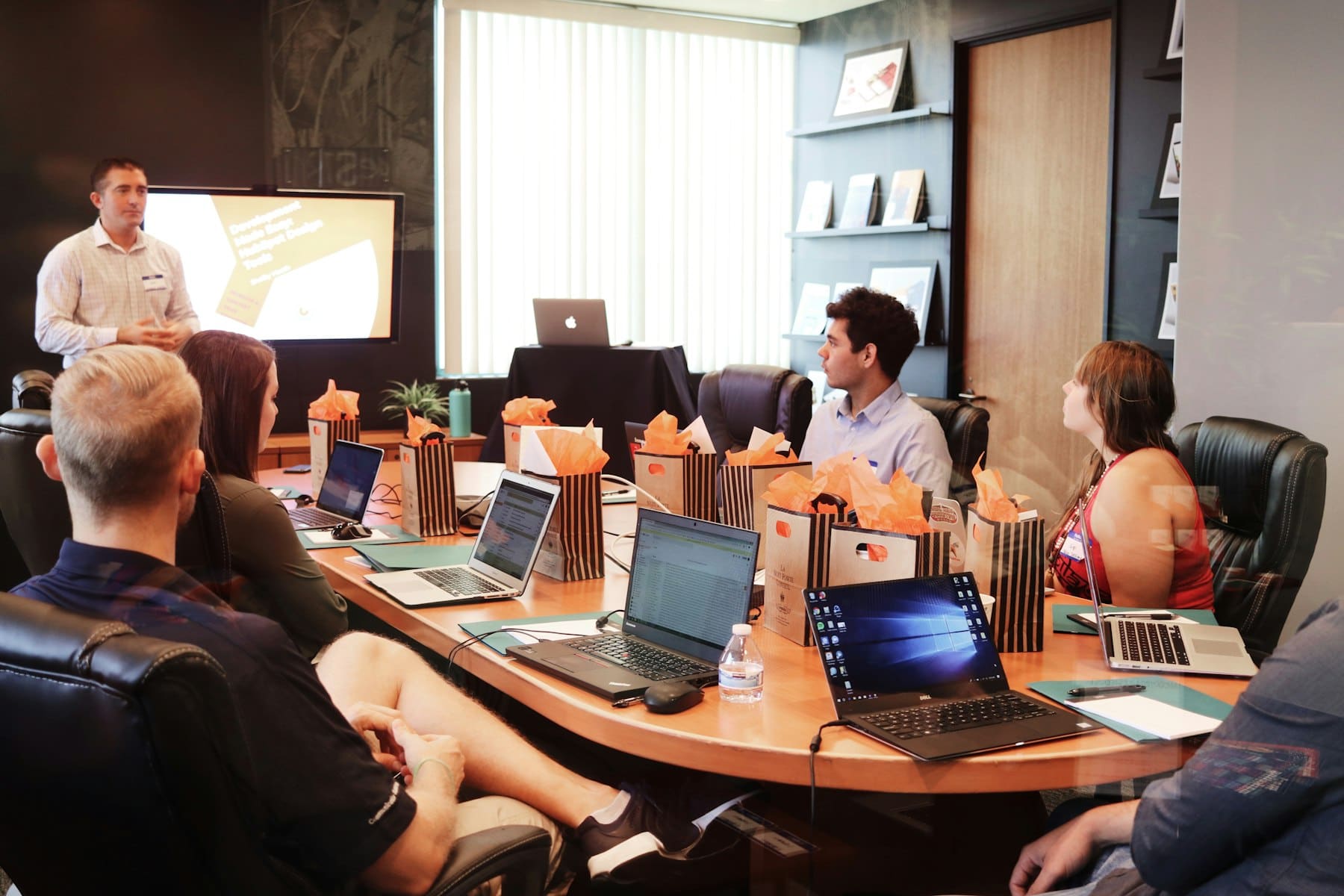 Elite Marketing Solutions team reviewing a growth strategy