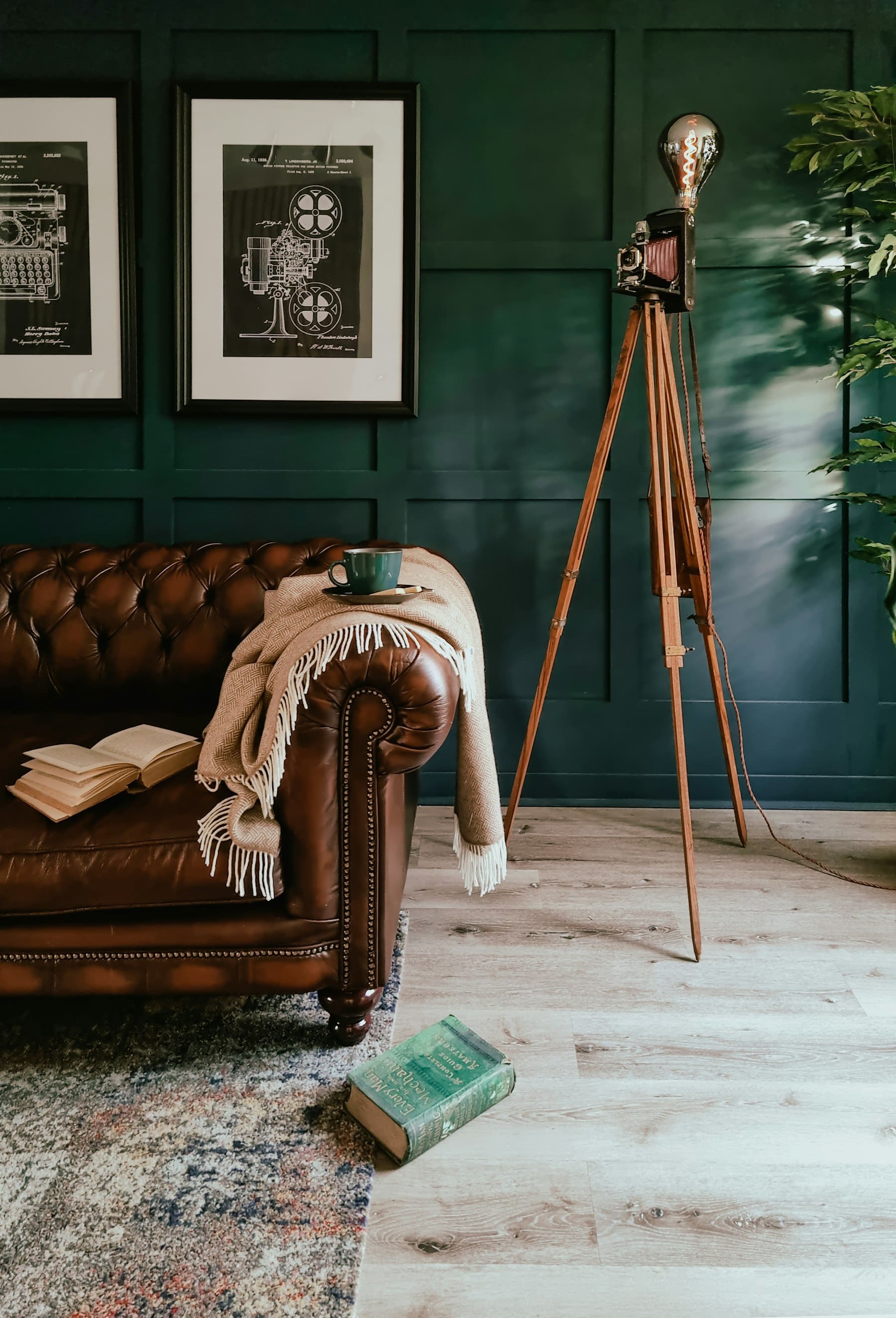 Camera and tripod set up inside a home for a listing photo shoot